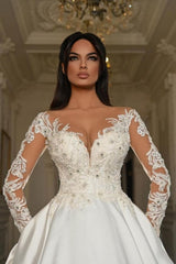 A Line Long Sleeve White Wedding Dress Beaded Lace Up Lace Ball Gown Bridal Gown With Pearls
