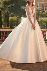 Dressystars Ball Gown Plunge Neck Sleeveless Court Train Satin Wedding Dress with Bow Pockets and Appliques