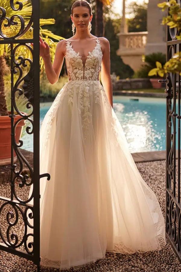 Dressystars White Wedding Dress A Line Spaghetti Strap V Neck Beaded Sleeveless Tulle Bridal Gown With Appliques