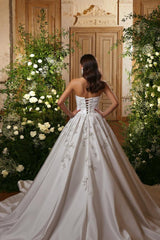 Dressystars White Wedding Dress A Line Strapless Beaded Ball Gown Sleeveless Cathedral Train Satin Bridal Gown With 3D Flowers