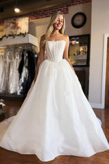 Dressystars White Wedding Dress Strapless A Line Sleeveless Floor Length Ball Gown Bridal Gown With Lace Bowknot