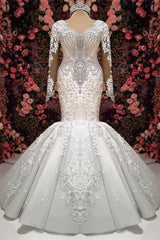 Elegant Sweetheart Long Sleeve Lace Mermaid Wedding Dress with Beading