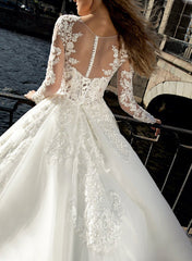 Illusion Neck A Line Wedding Dress with Long Sleeves and Sweep Train crafted from Lace and Tulle