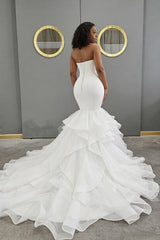 Sweetheart Tulle/Elastic Satin Wedding Dress With Cascading Ruffles Trumpet/Mermaid