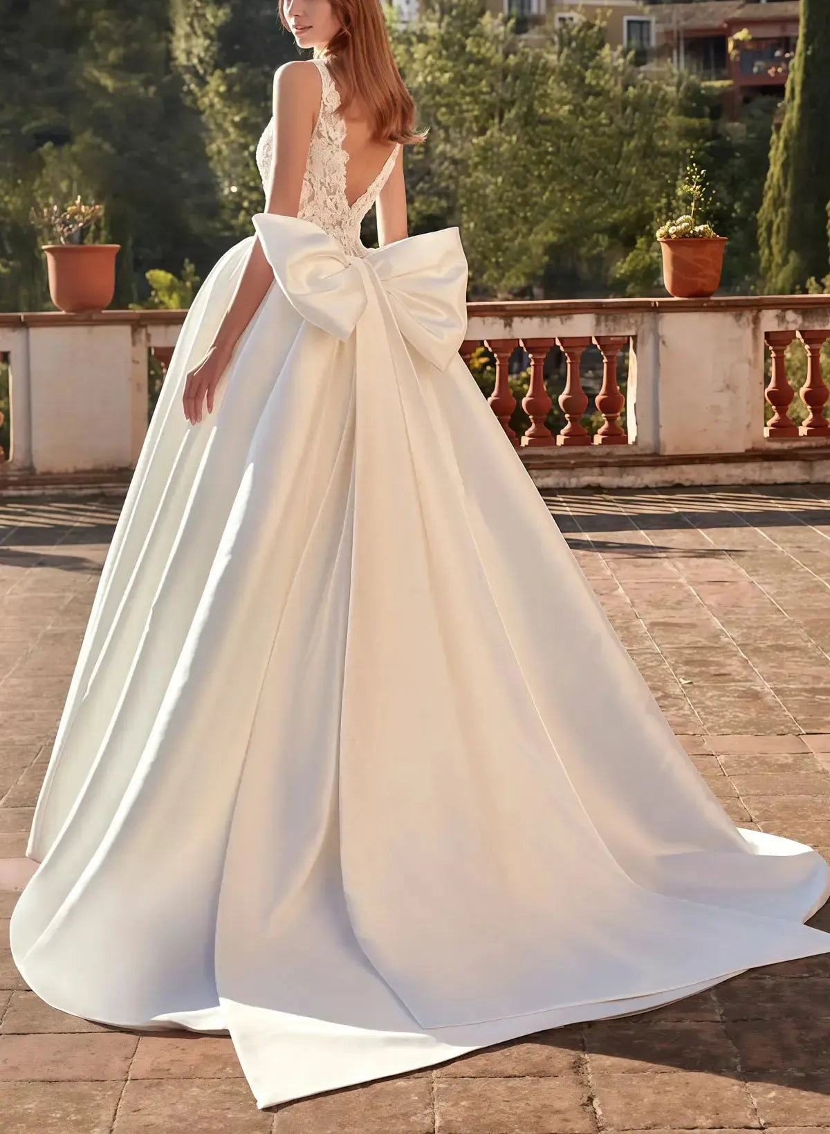 Dressystars Ball Gown Plunge Neck Sleeveless Court Train Satin Wedding Dress with Bow Pockets and Appliques