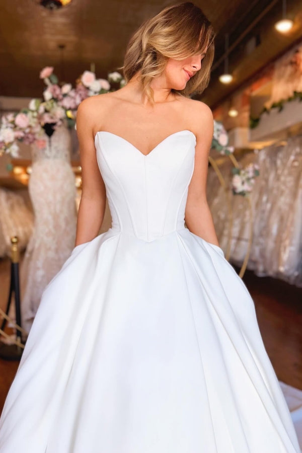 Dressystars Sweetheart White Wedding Dress Strapless A Line Satin Bridal Gown With Pockets