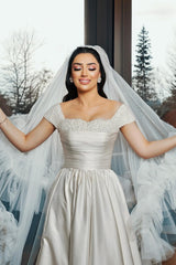 Dressystars White Wedding Dress A Line Off The Shoulder Sleeveless Beaded Ruffle Satin Bridal Gown With Slit