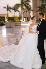 Dressystars White Wedding Dress Strapless Beaded Ball Gown Sleeveless Cathedral Train Tulle Bridal Gown With Appliques