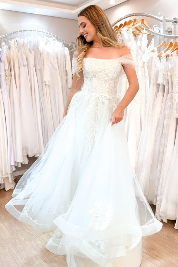 Lace and Tulle A Line Wedding Dress with Pockets and Off Shoulder Drape
