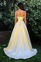 Light Yellow Strapless Satin Prom Dress With Beaded Sweetheart Neckline And High Slit Formal Evening Gown