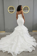 Sweetheart Tulle/Elastic Satin Wedding Dress With Cascading Ruffles Trumpet/Mermaid
